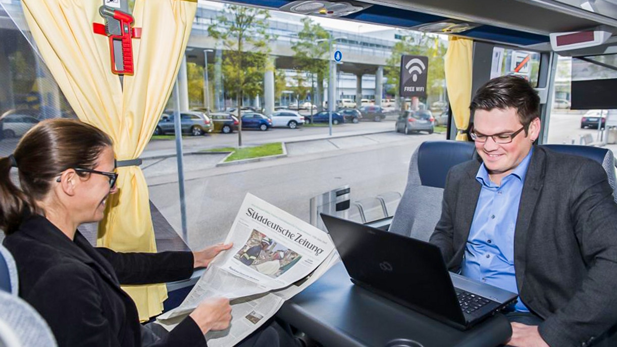 Passenger reading Newspaper