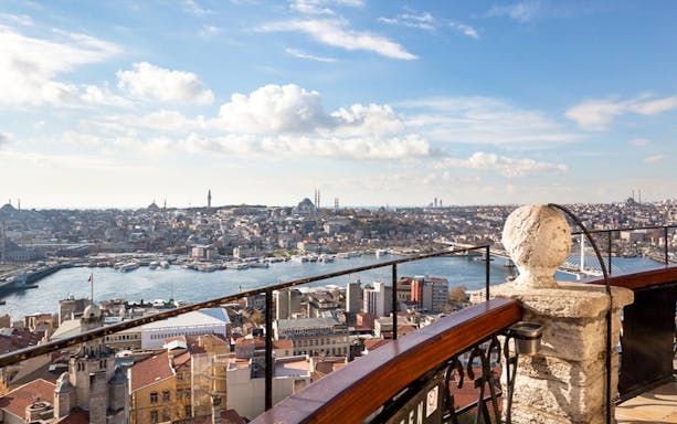 View of Istanbul from Galata Tower with Bosphorus and cityscape in the background.