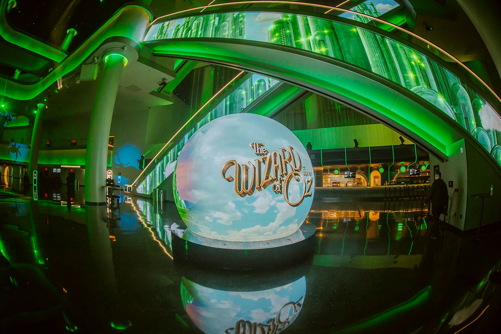 Wizard of Oz show entrance at Sphere with green illuminated decor.