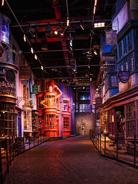 Diagon Alley set during Harry Potter London tour, featuring shopfronts and cobblestone path.