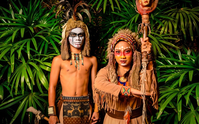Performers in traditional costumes at Sunway Lagoon Night Park.