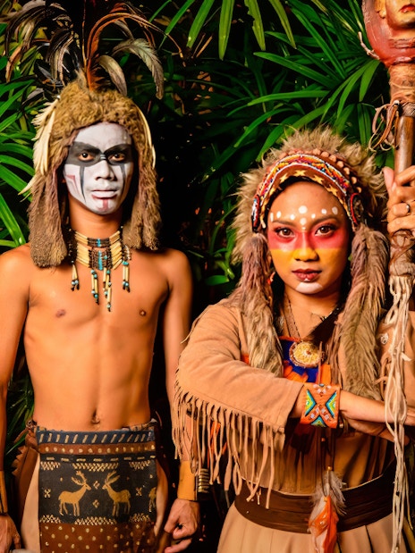Performers in traditional costumes at Sunway Lagoon Night Park.