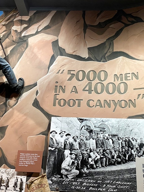 Hoover Dam worker mural and historical photo exhibit at Boulder City and Hoover Dam Museum.