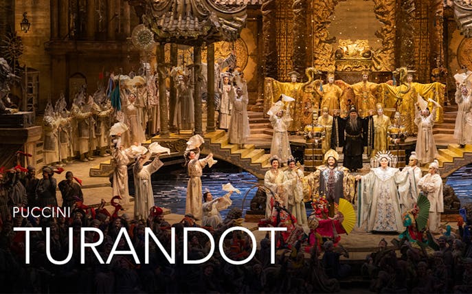 Opera performance of Puccini's Turandot with elaborate costumes and set design.