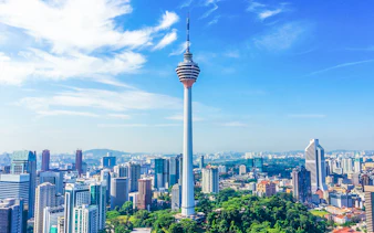 KL Tower Sky Deck overlooking Kuala Lumpur cityscape.