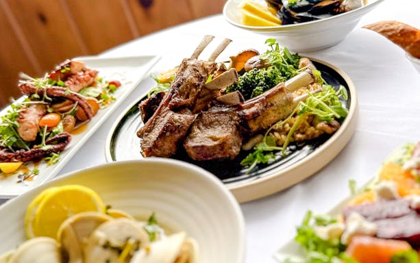 Lamb chops and seafood dishes on New Year's Eve Dinner Cruise.