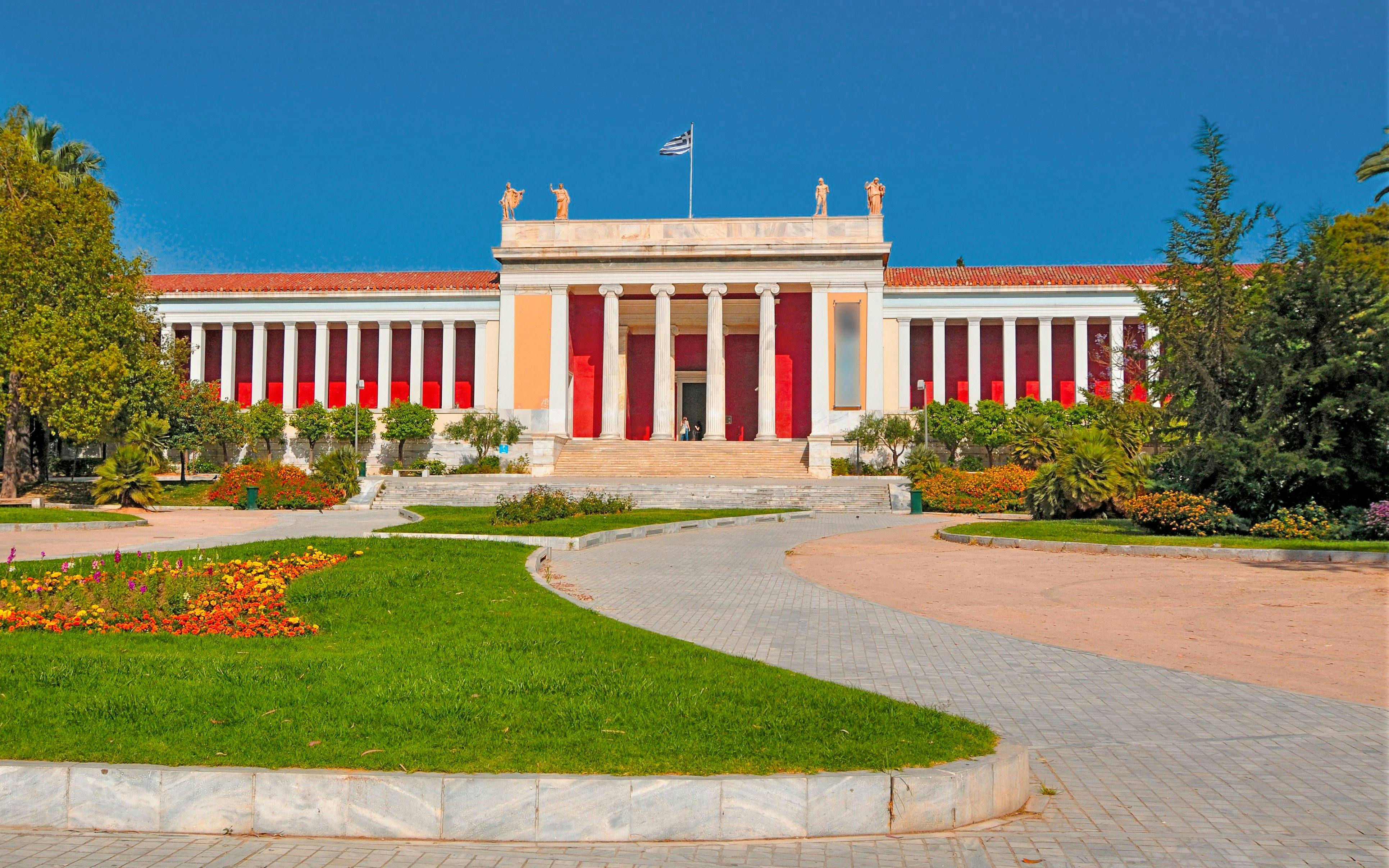National Archaeological Museum entrance with Greek flag, Athens, Greece.