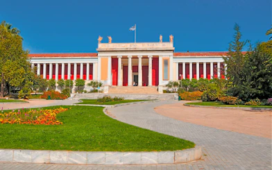 National Archaeological Museum entrance with Greek flag, Athens, Greece.