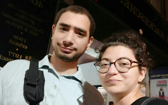Two people exploring the Berlin Jewish District during a self-guided city game.