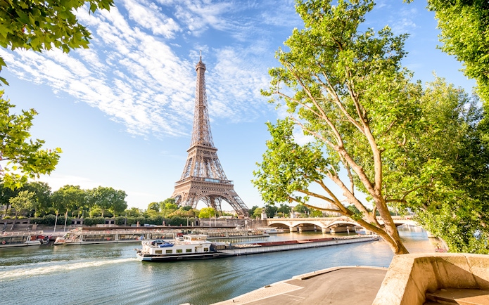 Seine river cruise with Eiffel Tower view in Paris.