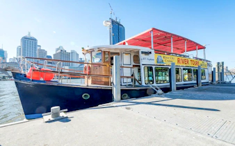 MV Neptune tour boat docked in Brisbane for River City Cruises.