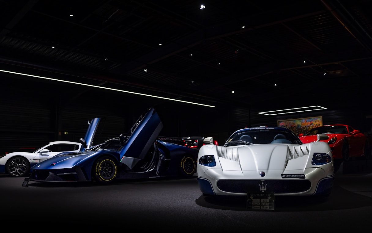 Luxury sports cars displayed at Coligny Car Museum, Lyon, France.
