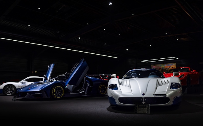 Luxury sports cars displayed at Coligny Car Museum, Lyon, France.