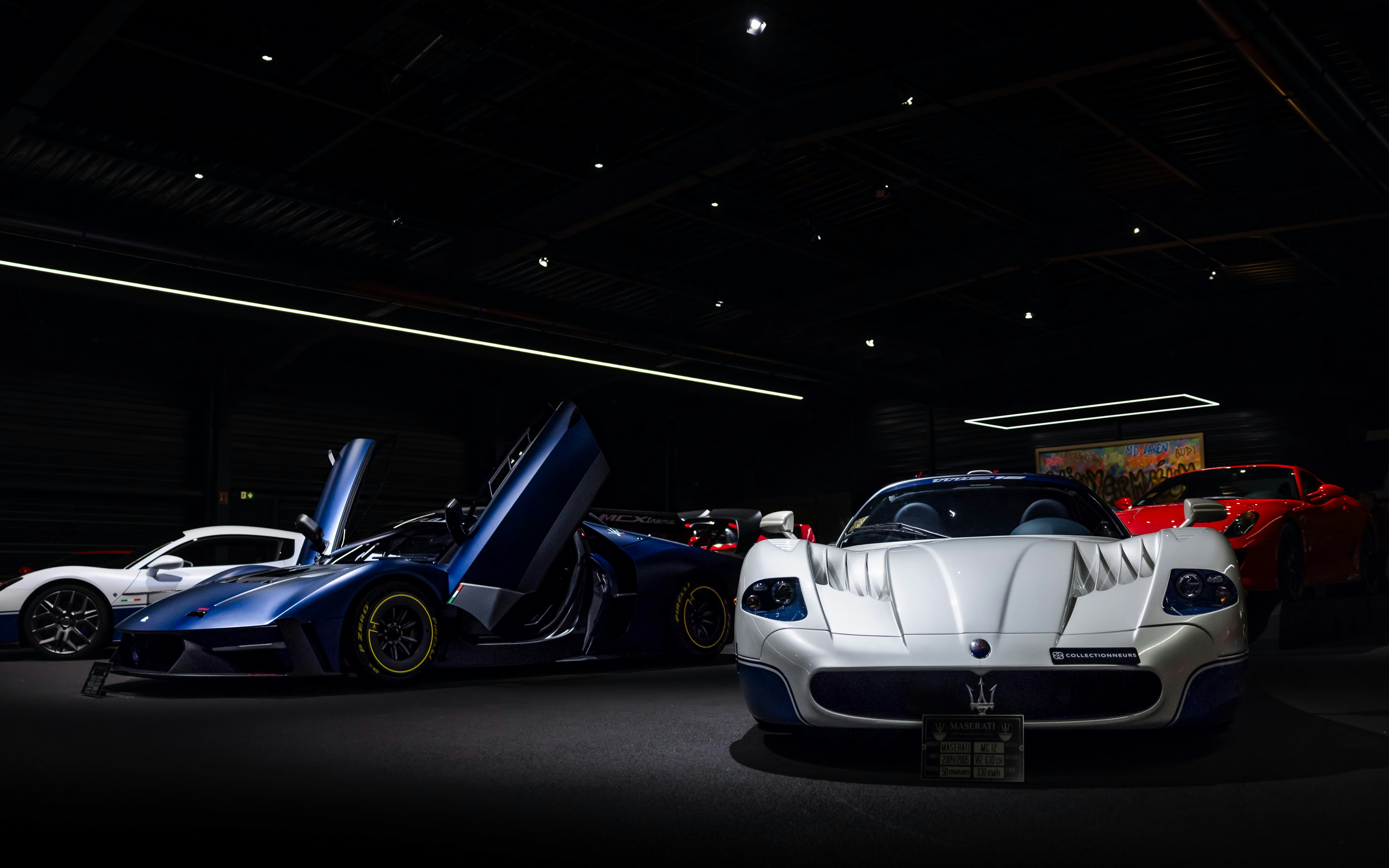 Luxury sports cars displayed at Coligny Car Museum, Lyon, France.