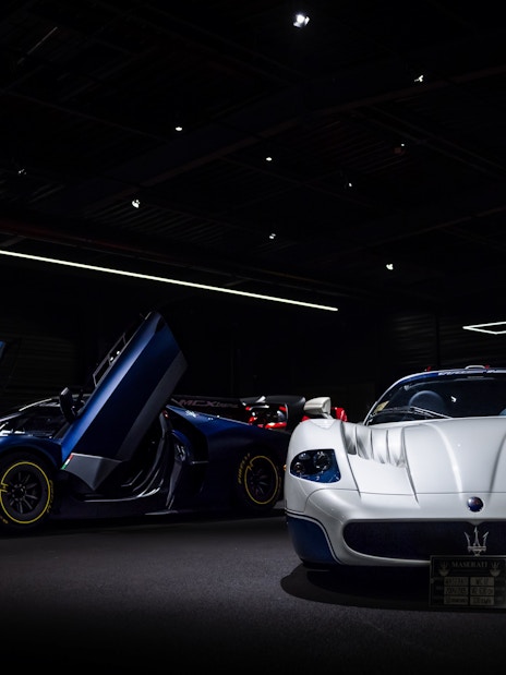 Luxury sports cars displayed at Coligny Car Museum, Lyon, France.