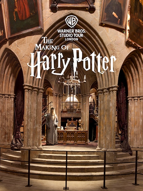 Dumbledore's office set at Warner Bros Studio Tour London, featuring portraits and magical artifacts.