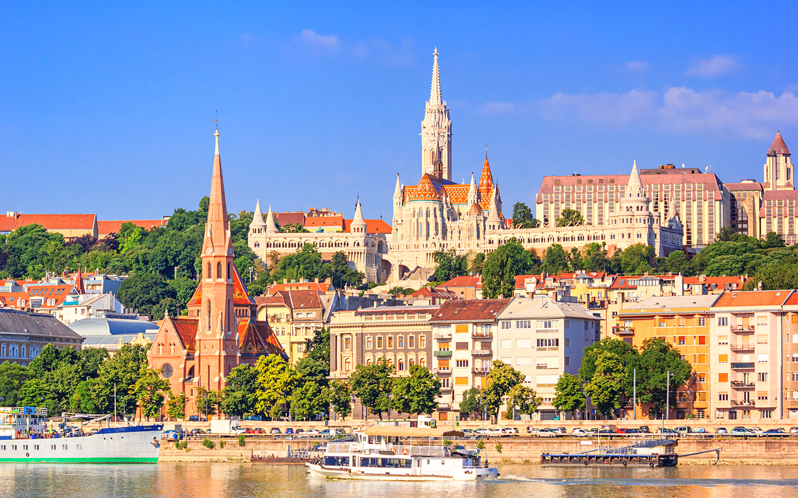 Buda Castle, palace complex on Castle Hill with Matthias Church over the Danube river in Budapest, Hungary  - Discover Budapest in 1 day