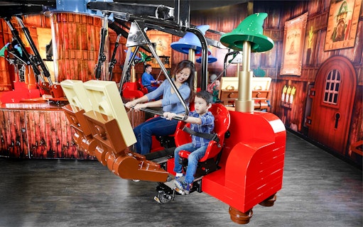Mother and child enjoying a ride at LEGOLAND Discovery Centre Oberhausen.