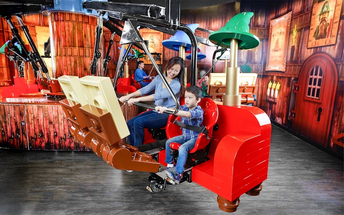 Mother and child enjoying a ride at LEGOLAND Discovery Centre Oberhausen.