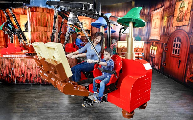 Mother and child enjoying a ride at LEGOLAND Discovery Centre Oberhausen.