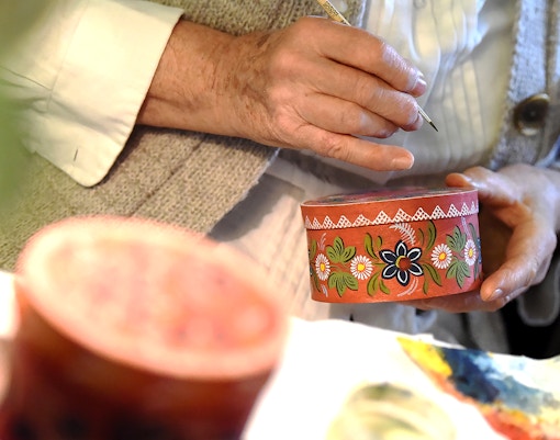 Reindeer sledding near gift shops and handicrafts in snowy Lapland, Finland.