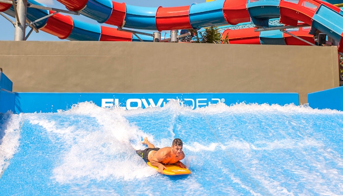 Man surfing on the Flowrider at Andamanda Phuket