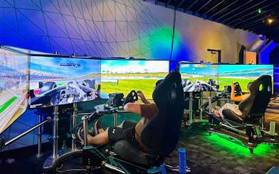 Visitors using racing simulators at Petrosains, The Discovery Centre in Kuala Lumpur.