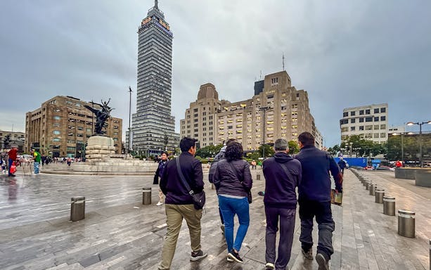 Historic Mexico City tour featuring the iconic Metropolitan Cathedral and bustling Zócalo Square.