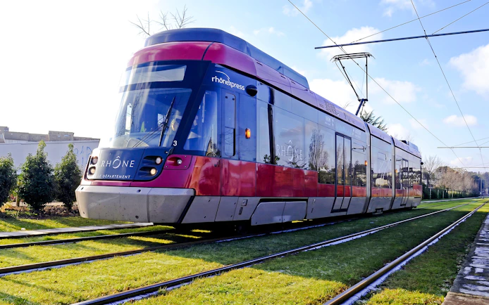 Rhone Express tram on tracks during Lyon City Tour.