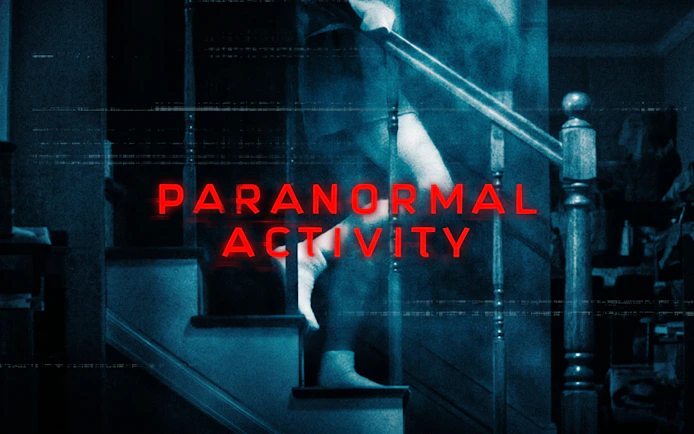Ghostly figure on staircase with 'Paranormal Activity' text, Broadway theme.