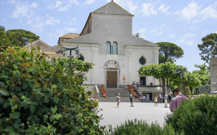 Ravello Cathedral facade with visitors, Amalfi Coast.