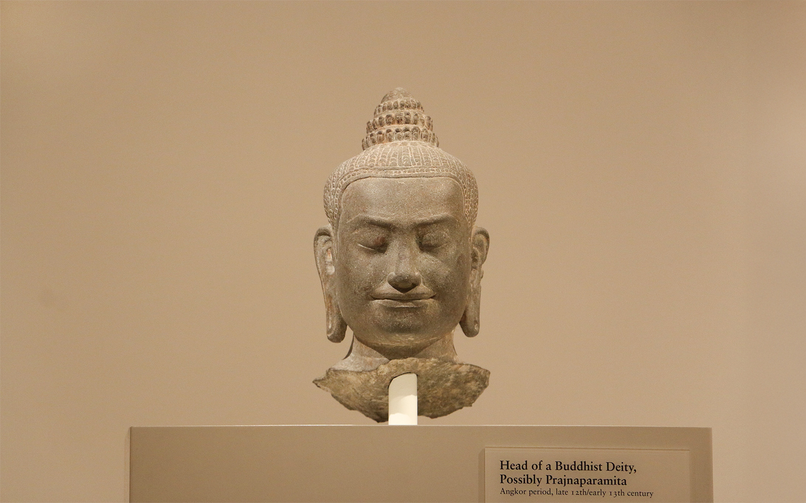 Head of a Buddhist Deity sculpture at The Art Institute of Chicago.
