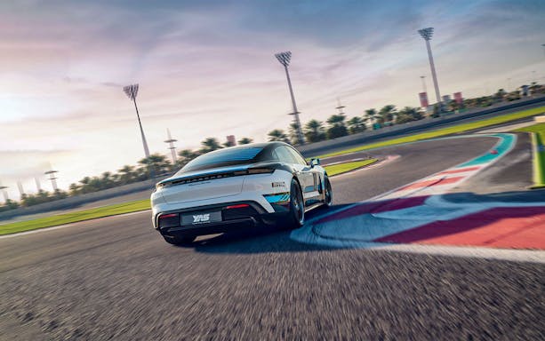 Porsche Taycan Turbo on Yas Marina Circuit track in Abu Dhabi.