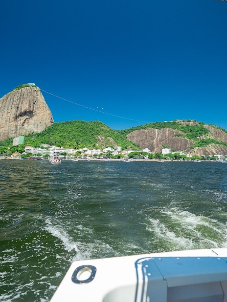 Boat view of Sugarloaf Mountain in Rio de Janeiro during a tour.