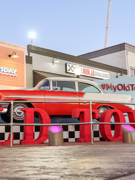 Classic car display at Old Town, Orlando with #MyOldTownUSA sign.