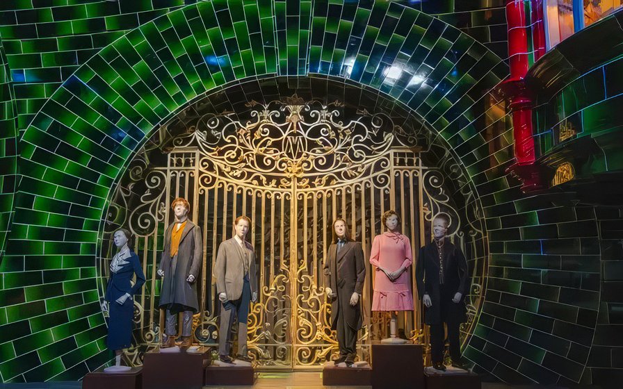 Mannequins in front of ornate gate at Ministry of Magic set, Warner Bros. Studio Tour Tokyo.