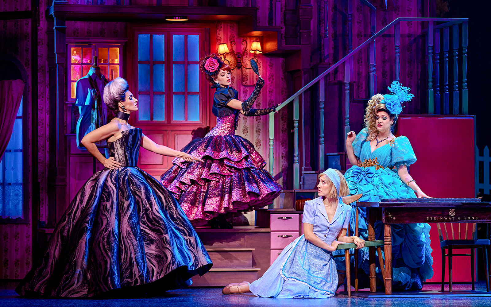 Cinderella stage scene with characters in elaborate costumes during a performance in Madrid.