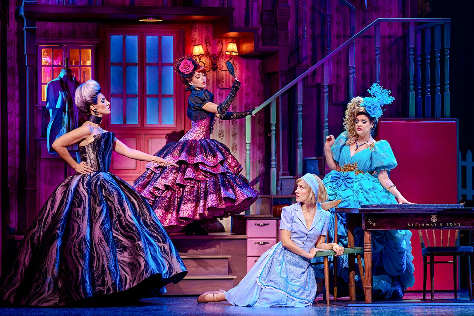 Cinderella stage scene with characters in elaborate costumes during a performance in Madrid.