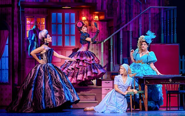 Cinderella stage scene with characters in elaborate costumes during a performance in Madrid.