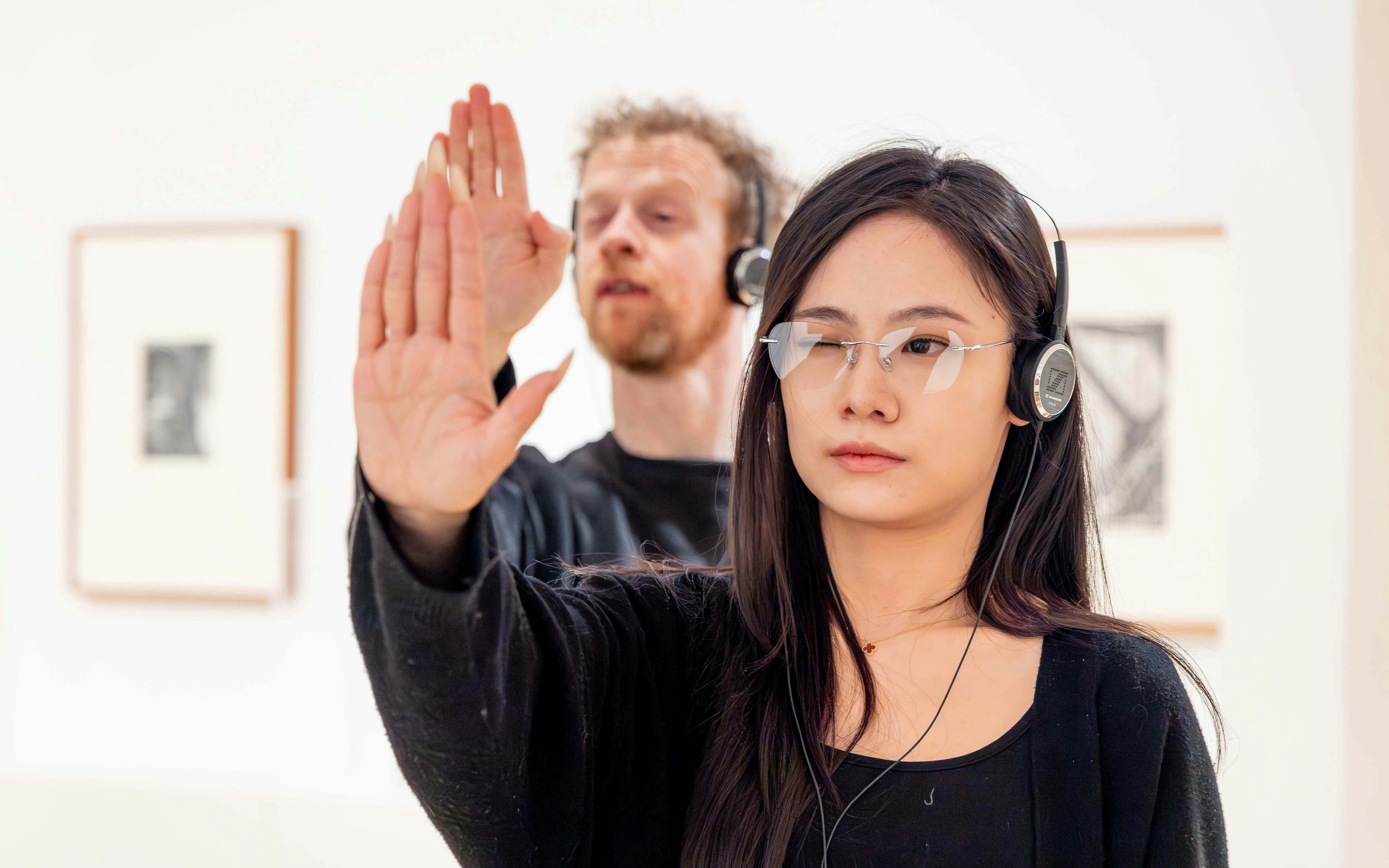 Visitors engaging with interactive exhibit at National Gallery of Victoria.