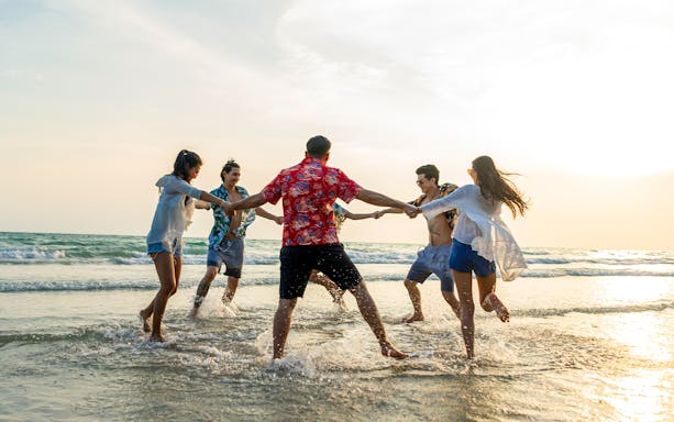 Group enjoying beach during speedboat tour of Vulcano, Stromboli, and Panarea Islands from Lipari.