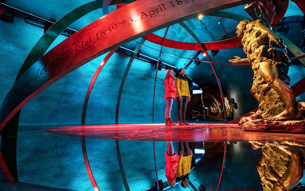 Visitors exploring the Ice Palace at Jungfraujoch, Switzerland.