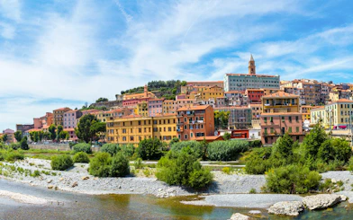 Colorful hillside buildings in the Italian Riviera, part of the Monte Carlo full-day tour.