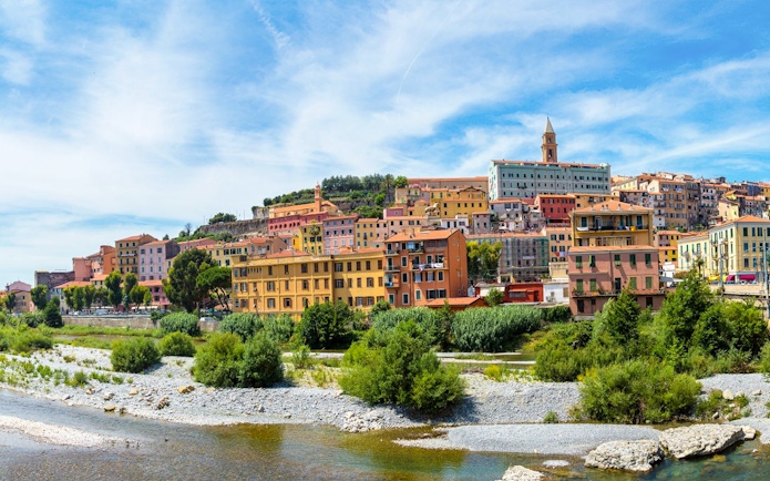 Colorful hillside buildings in the Italian Riviera, part of the Monte Carlo full-day tour.