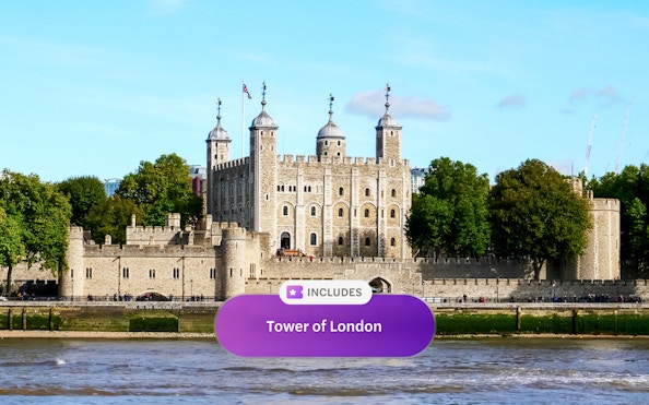 Tower of London with river view and historic architecture.
