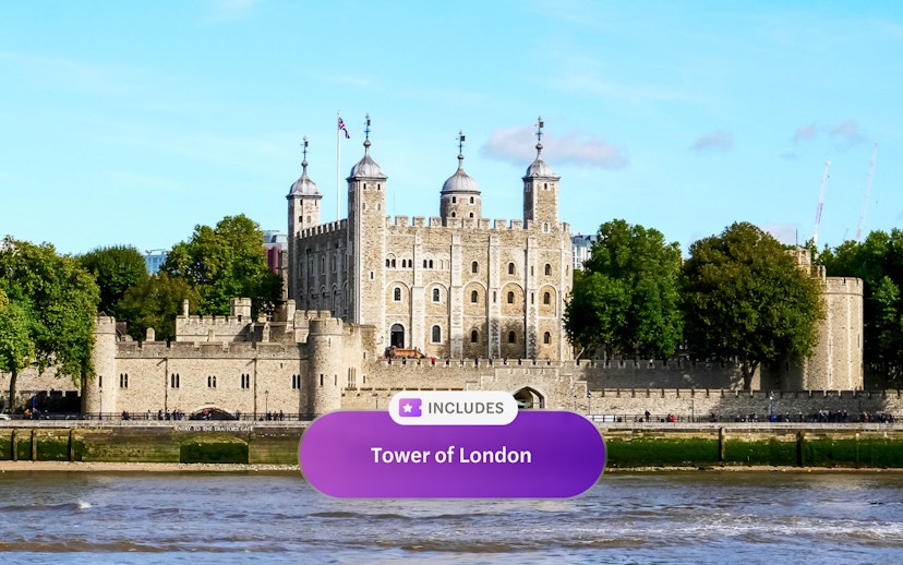 Tower of London with river view and historic architecture.