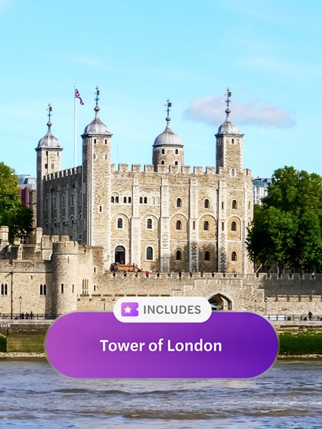 Tower of London with river view and historic architecture.