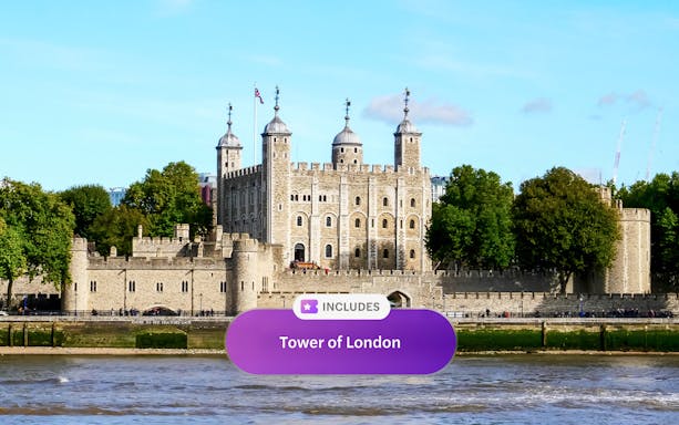 Tower of London with river view and historic architecture.