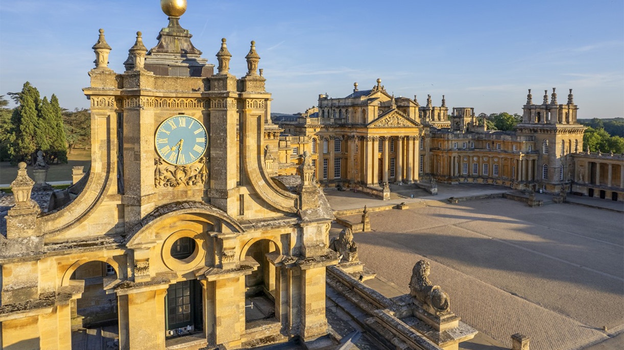 Blenheim Palace courtyard with clock tower and historic architecture in Oxfordshire, England.
