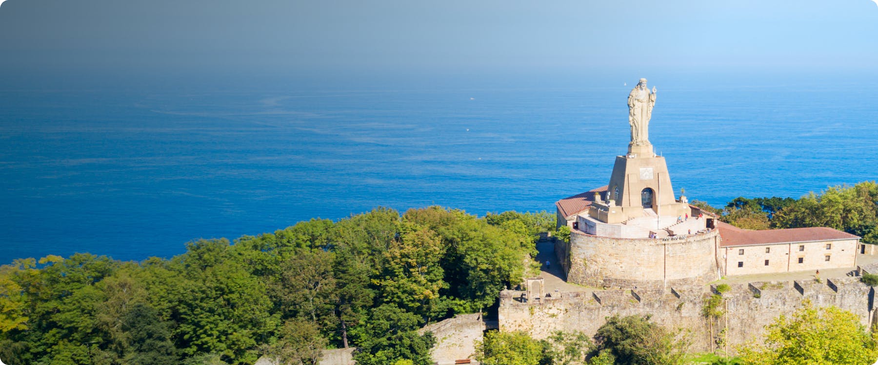 Statue of Christ on Monte Urgull overlooking the sea in San Sebastian.